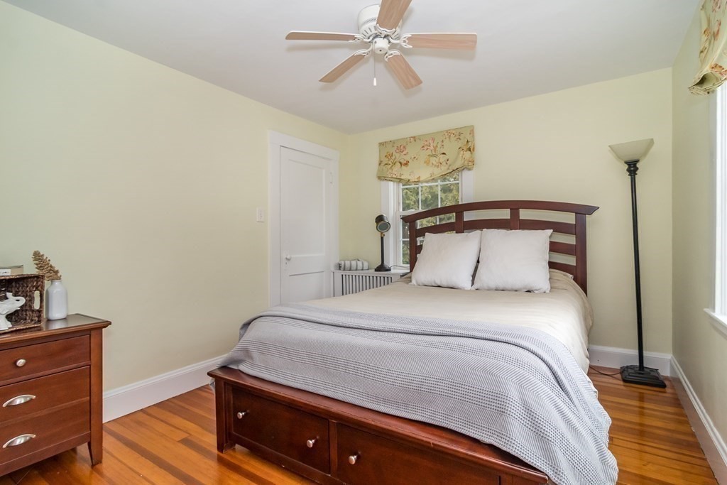 374 Weston Road Wellesley, MA 02482 - Photo 14 of 21 a bedroom with a bed and a dresser