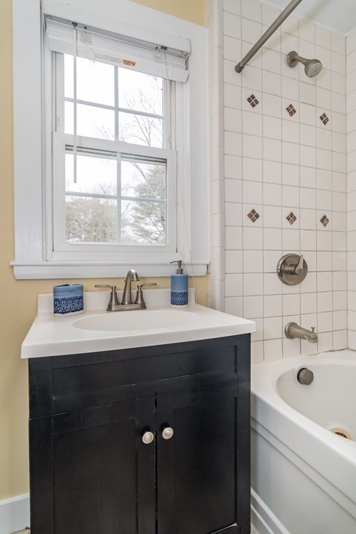 374 Weston Road Wellesley, MA 02482 - Photo 16 of 21 a bathroom with a sink and a window