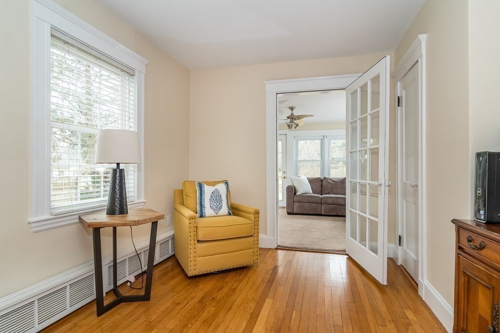 374 Weston Road Wellesley, MA 02482 - Photo 18 of 21 a bedroom with furniture and a wooden floor