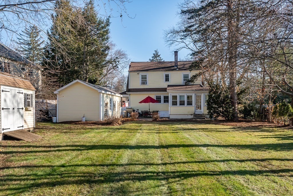 374 Weston Road Wellesley, MA 02482 - Photo 21 of 21 a view of a house with a big yard