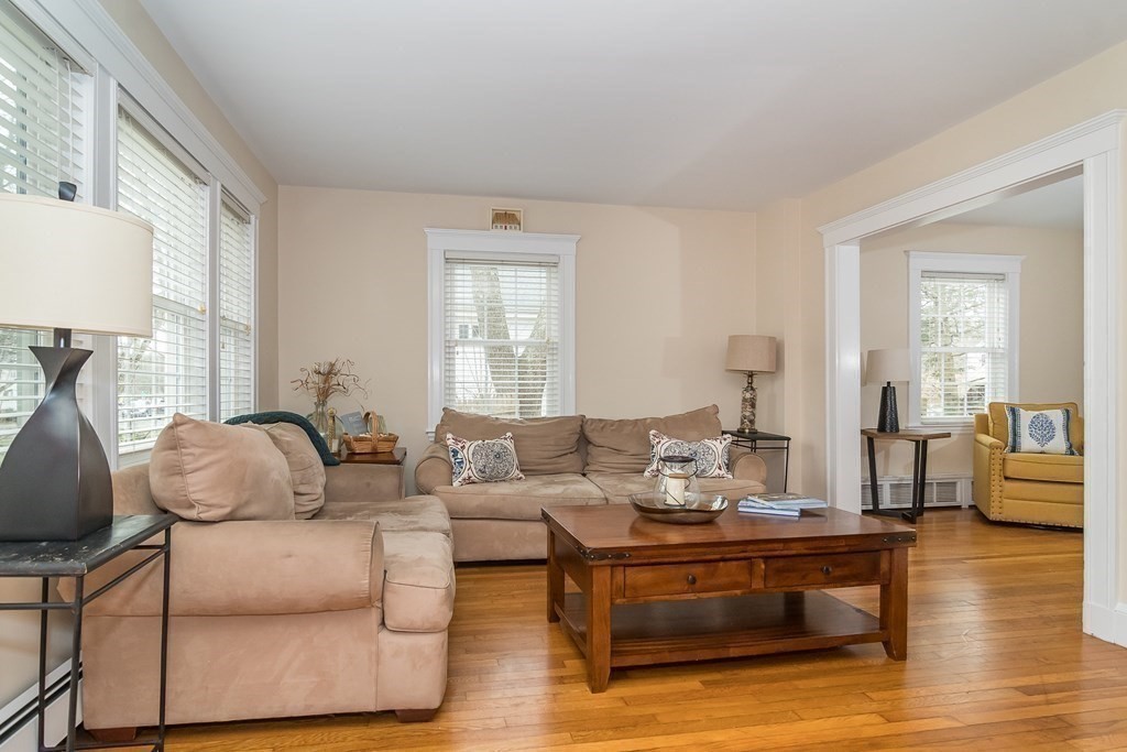 374 Weston Road Wellesley, MA 02482 - Photo 6 of 21 a living room with furniture and a wooden floor