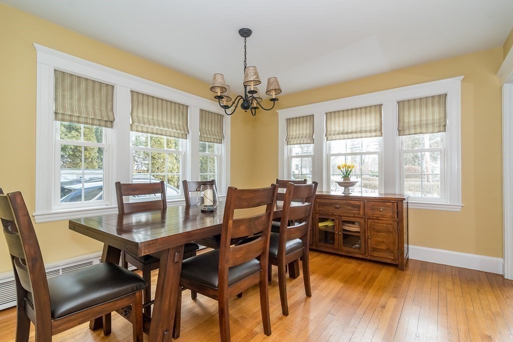 374 Weston Road Wellesley, MA 02482 - Photo 8 of 21 a dining room with furniture window wooden floor
