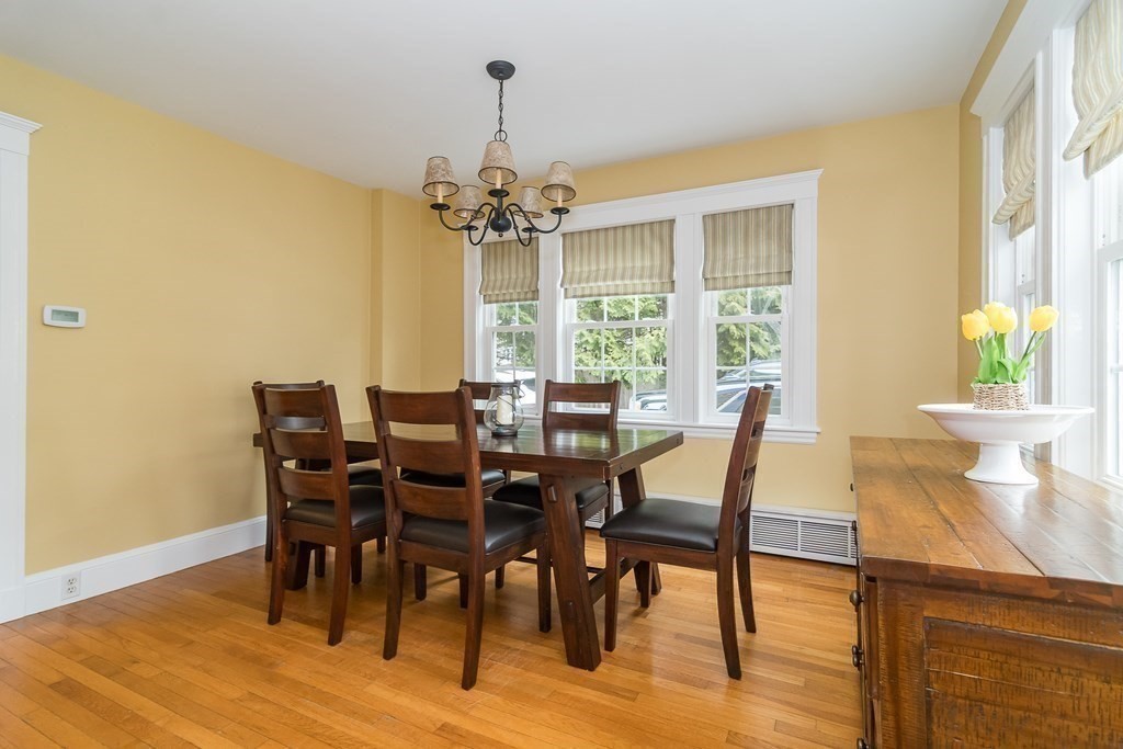 374 Weston Road Wellesley, MA 02482 - Photo 9 of 21 a view of a dining room with furniture window and wooden floor