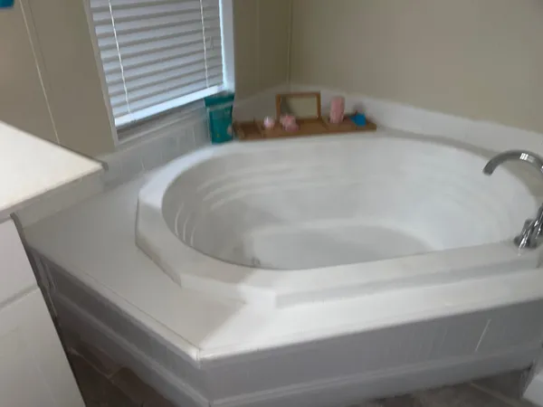 a en suite bathroom with a bathtub