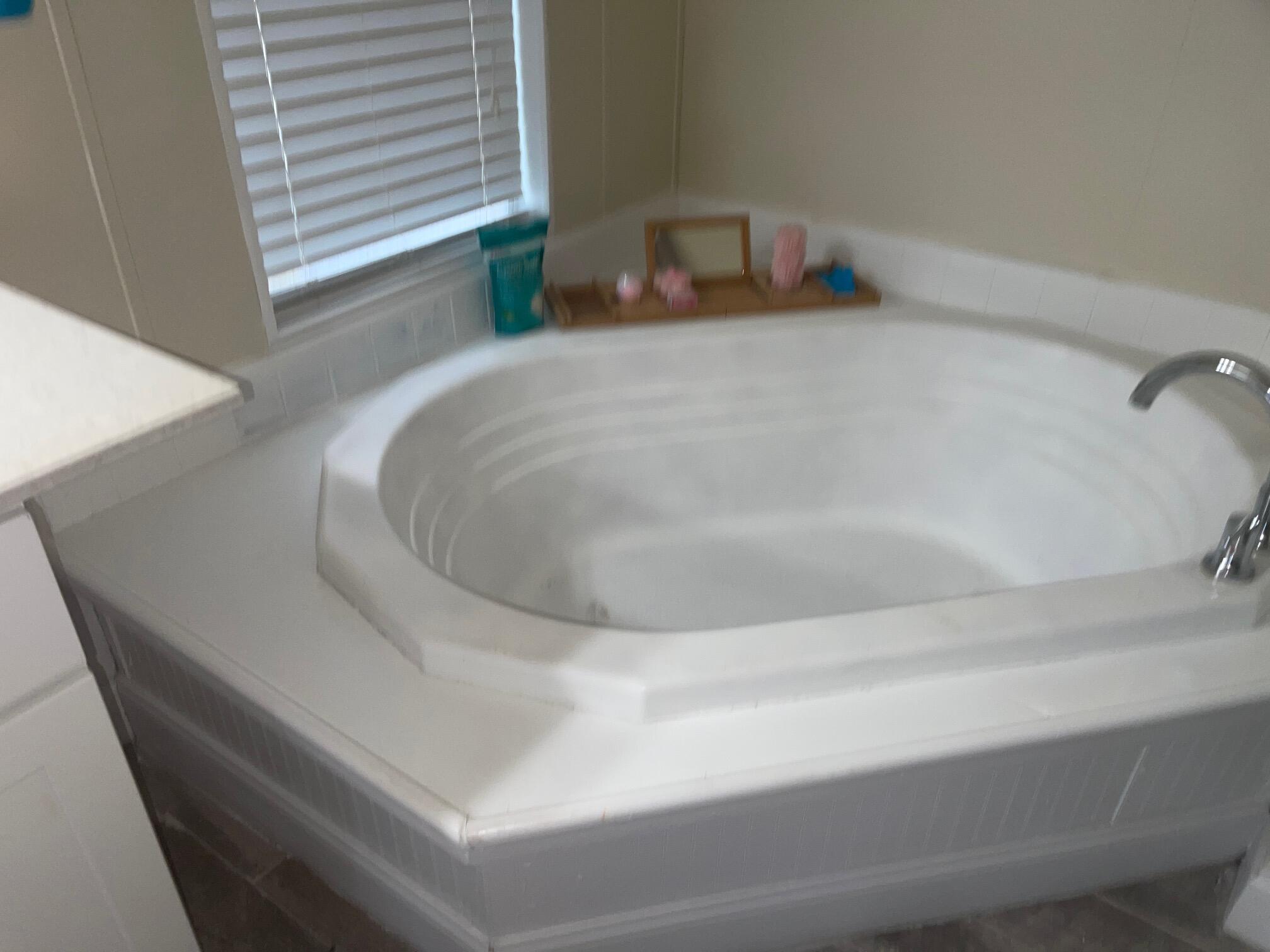 10552 Marina Way Boca Raton, FL 33428 - Photo 15 of 22 a en suite bathroom with a bathtub