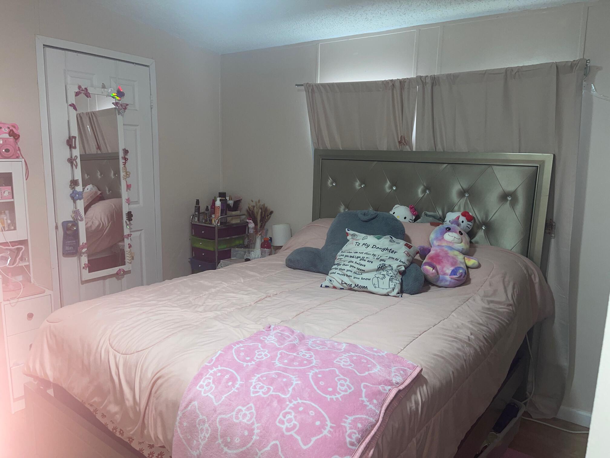 10552 Marina Way Boca Raton, FL 33428 - Photo 17 of 22 a bedroom with a bed and a potted plant