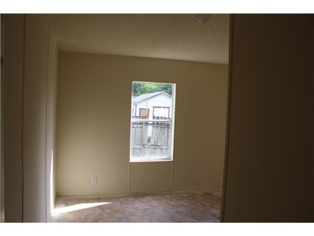 10552 Marina Way Boca Raton, FL 33428 - Photo 20 of 22 a view of an empty room with a window