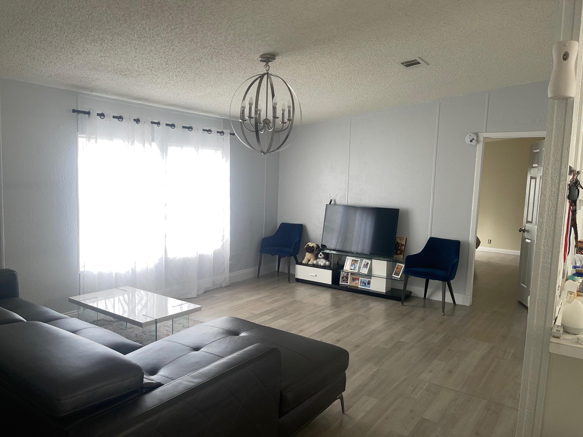 10552 Marina Way Boca Raton, FL 33428 - Photo 9 of 22 a living room with furniture and a window