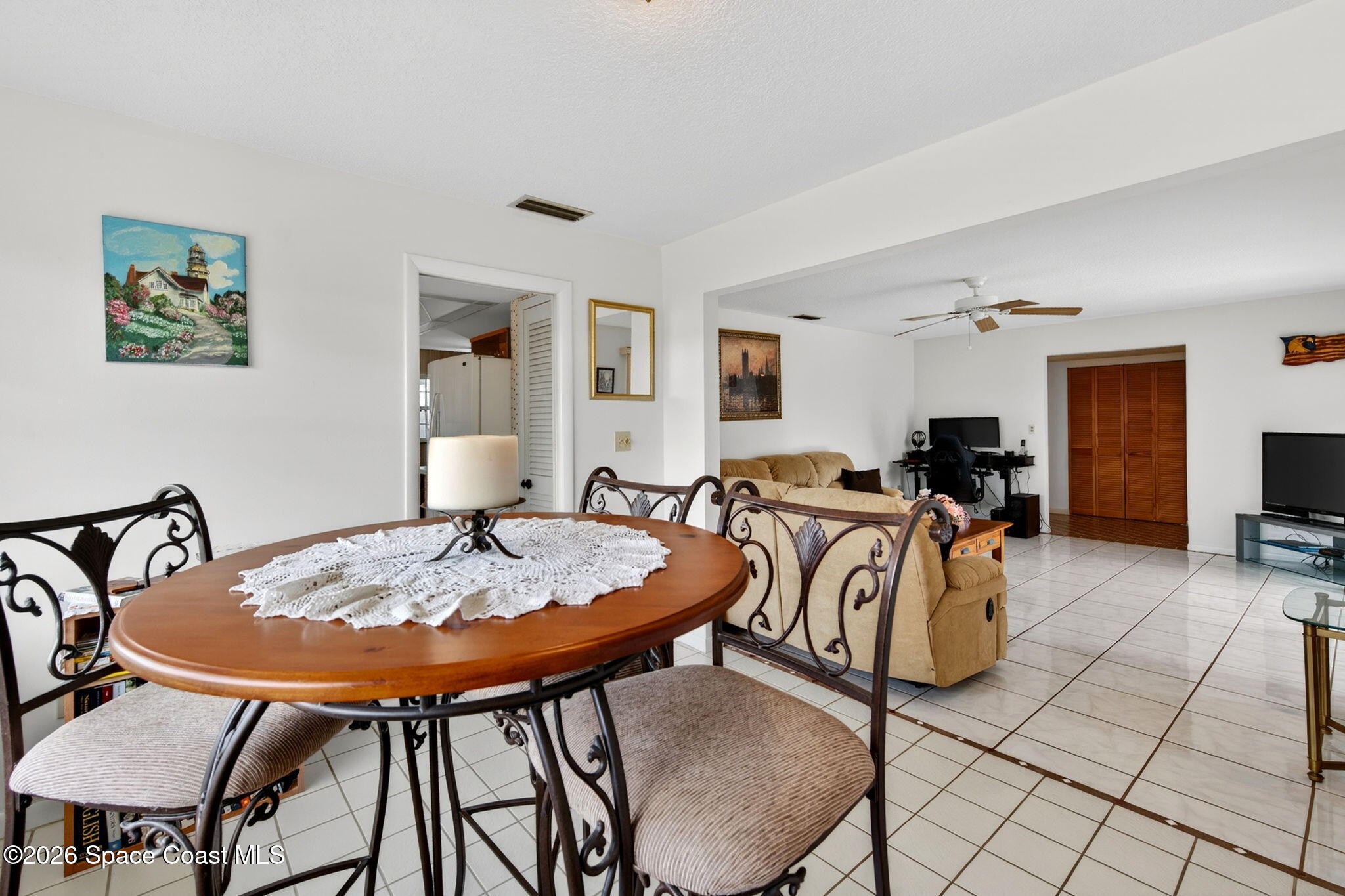 956 Waialae Circle Northeast Palm Bay, FL 32905 - Photo 19 of 45 a view of a livingroom with furniture and window