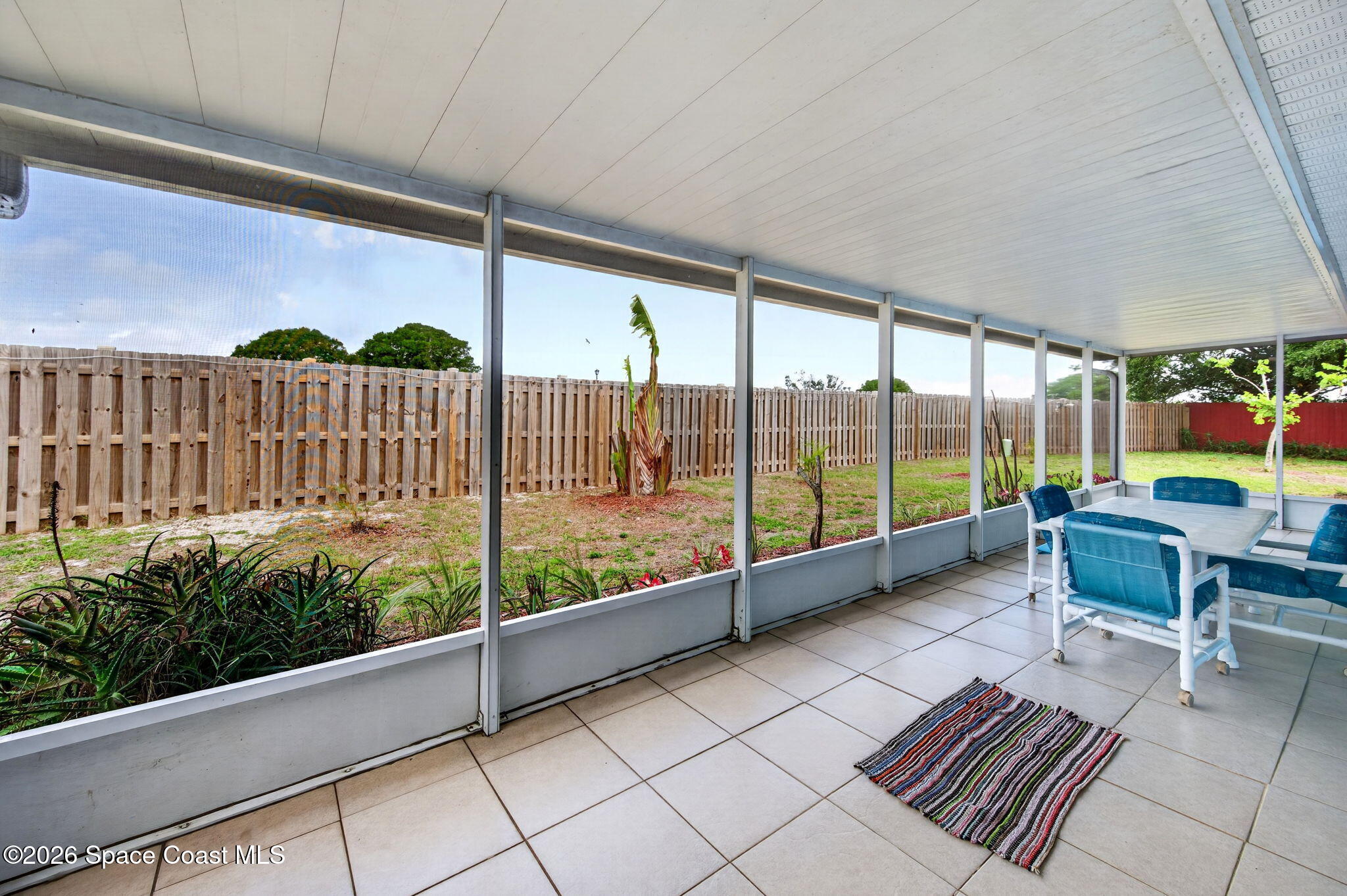 956 Waialae Circle Northeast Palm Bay, FL 32905 - Photo 39 of 45 a view of a balcony with chairs