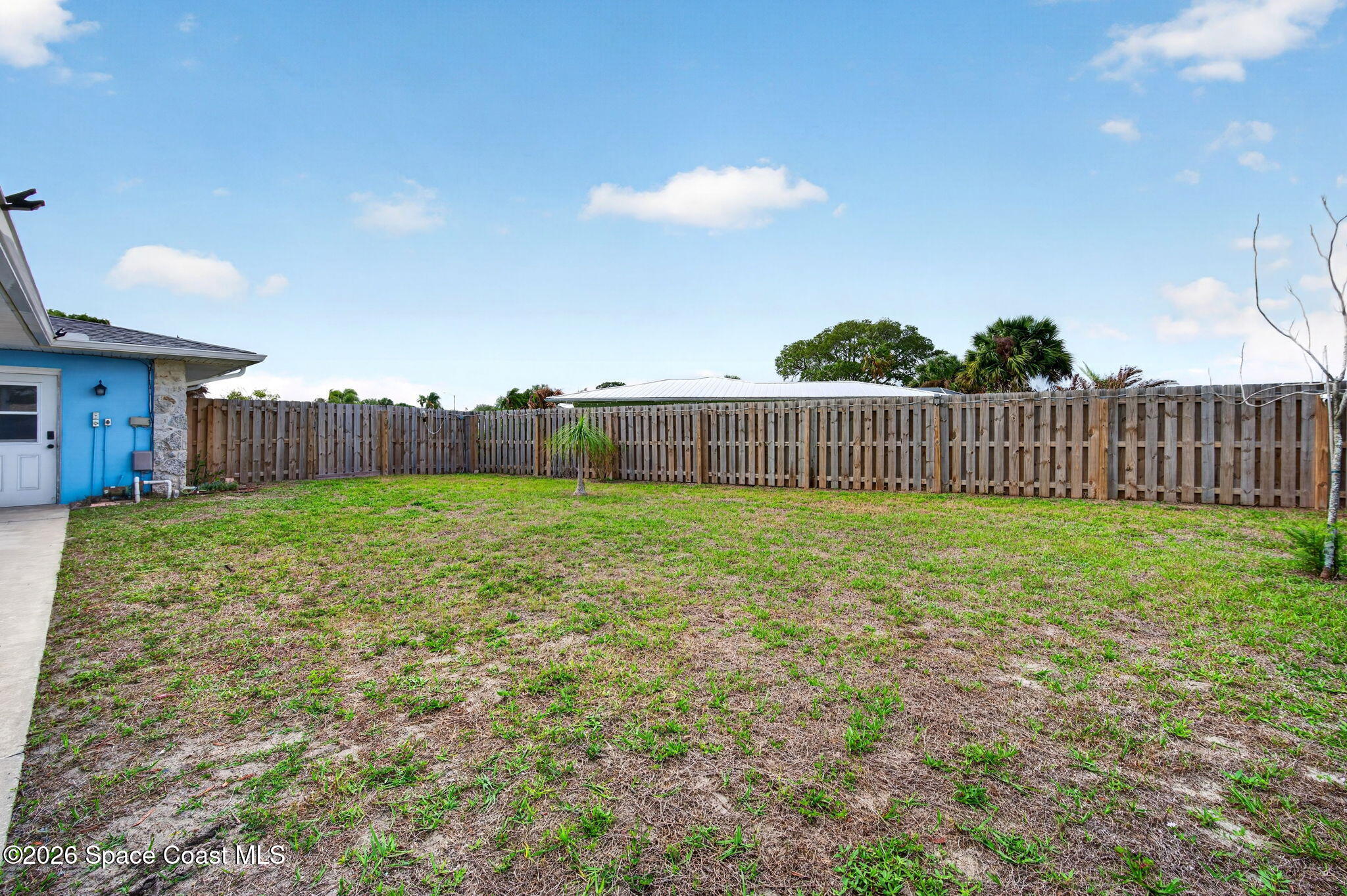 956 Waialae Circle Northeast Palm Bay, FL 32905 - Photo 41 of 45 a view of a garden