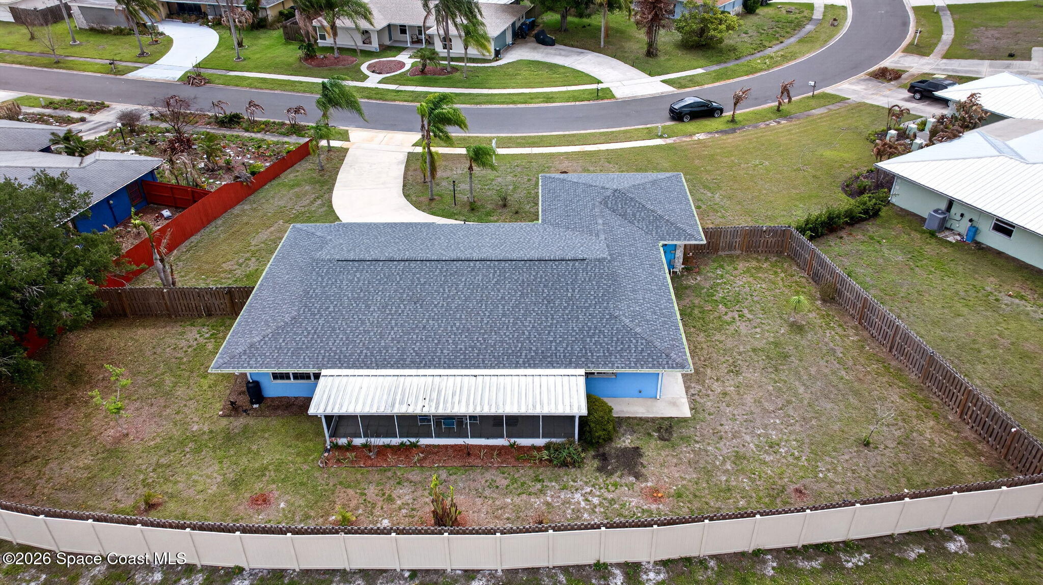 956 Waialae Circle Northeast Palm Bay, FL 32905 - Photo 7 of 45 an aerial view of a house with outdoor space