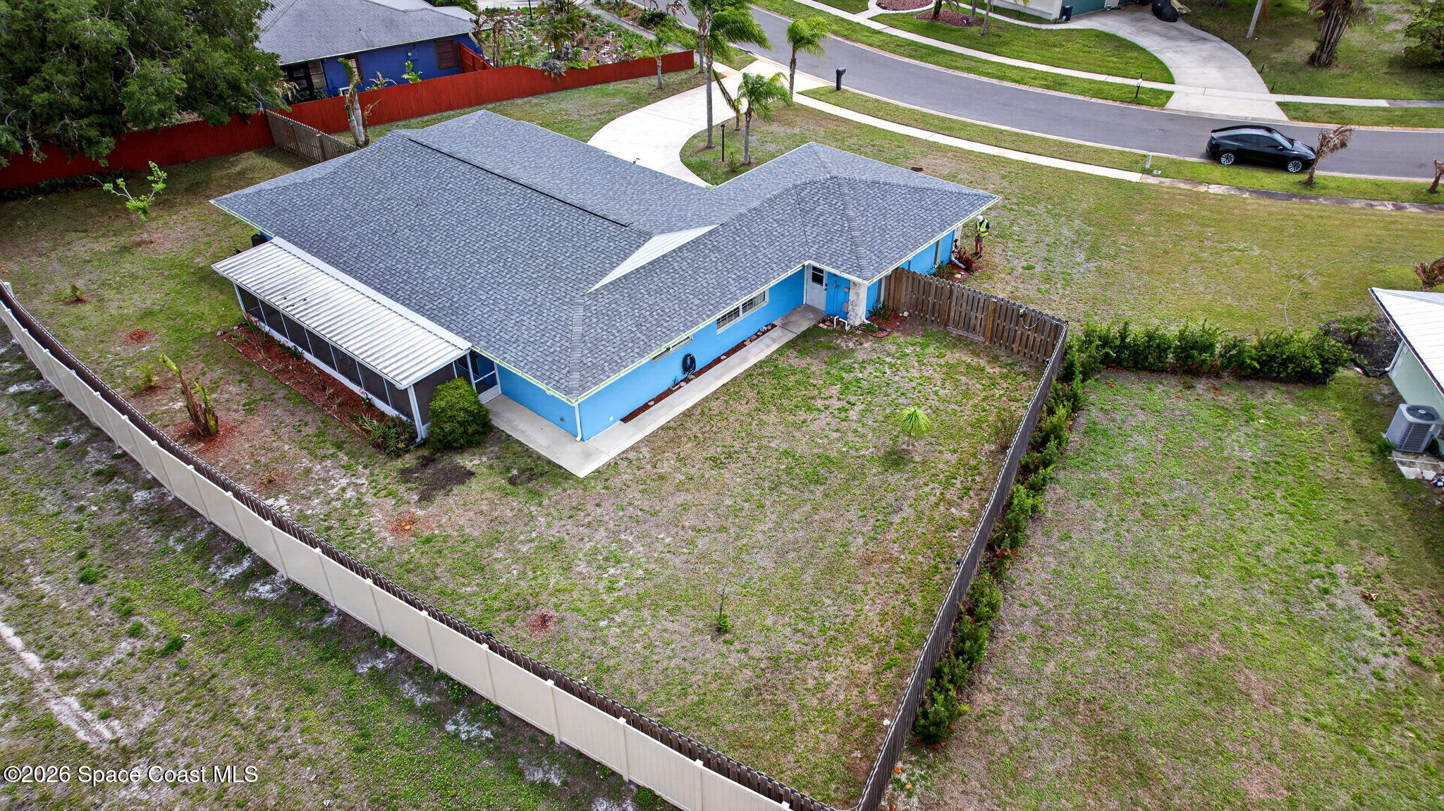 956 Waialae Circle Northeast Palm Bay, FL 32905 - Photo 8 of 45 a view of a yard in front of the house