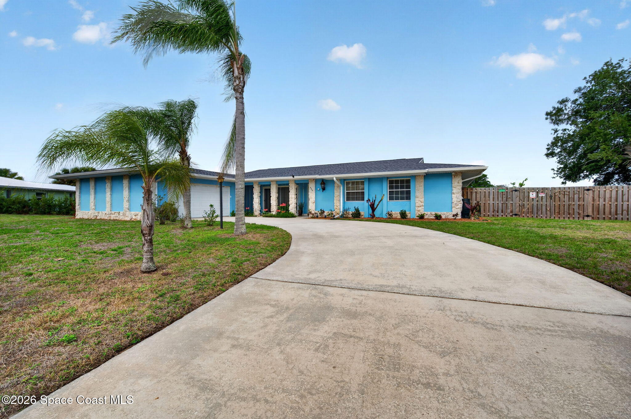 956 Waialae Circle Northeast Palm Bay, FL 32905 - Photo 10 of 45 a view of house with outdoor space and swimming pool