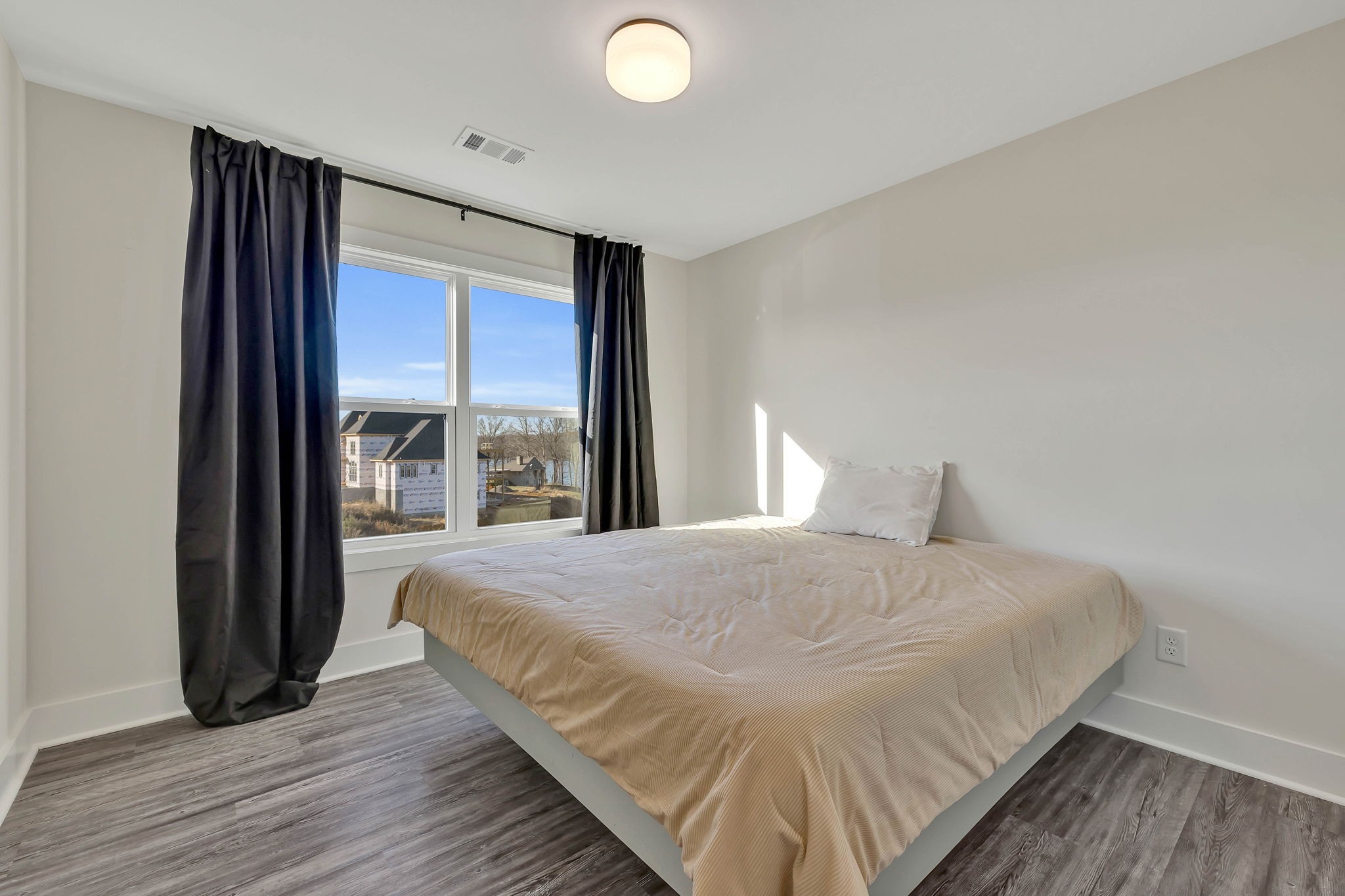 159 Kathryn Adele Lane Mount Juliet, TN 37122 - Photo 38 of 68 a bedroom with a bed and large windows