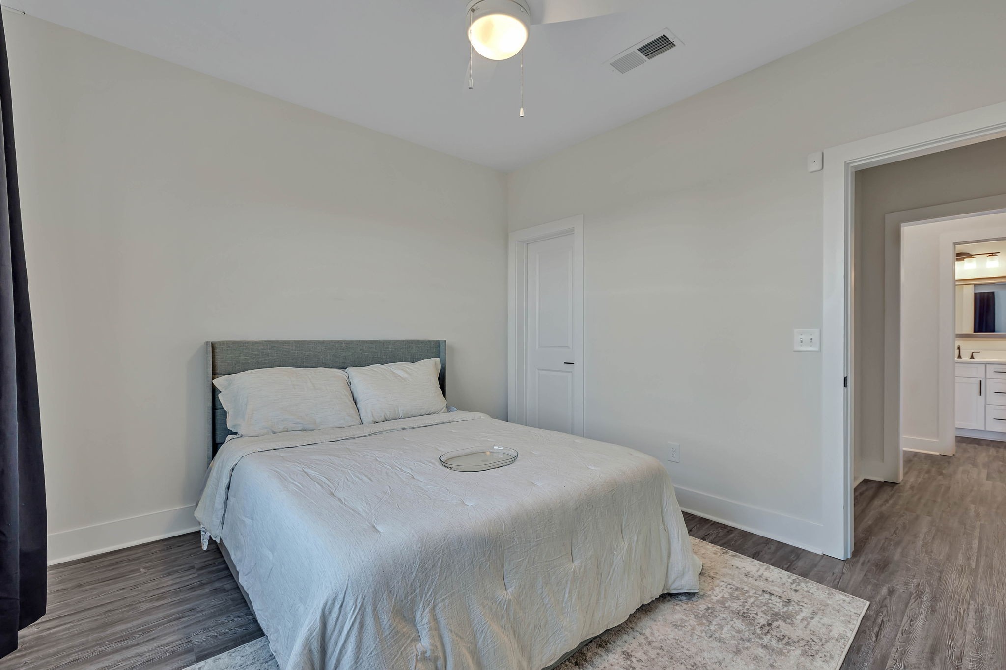 159 Kathryn Adele Lane Mount Juliet, TN 37122 - Photo 54 of 68 a bedroom with a bed and wooden floor