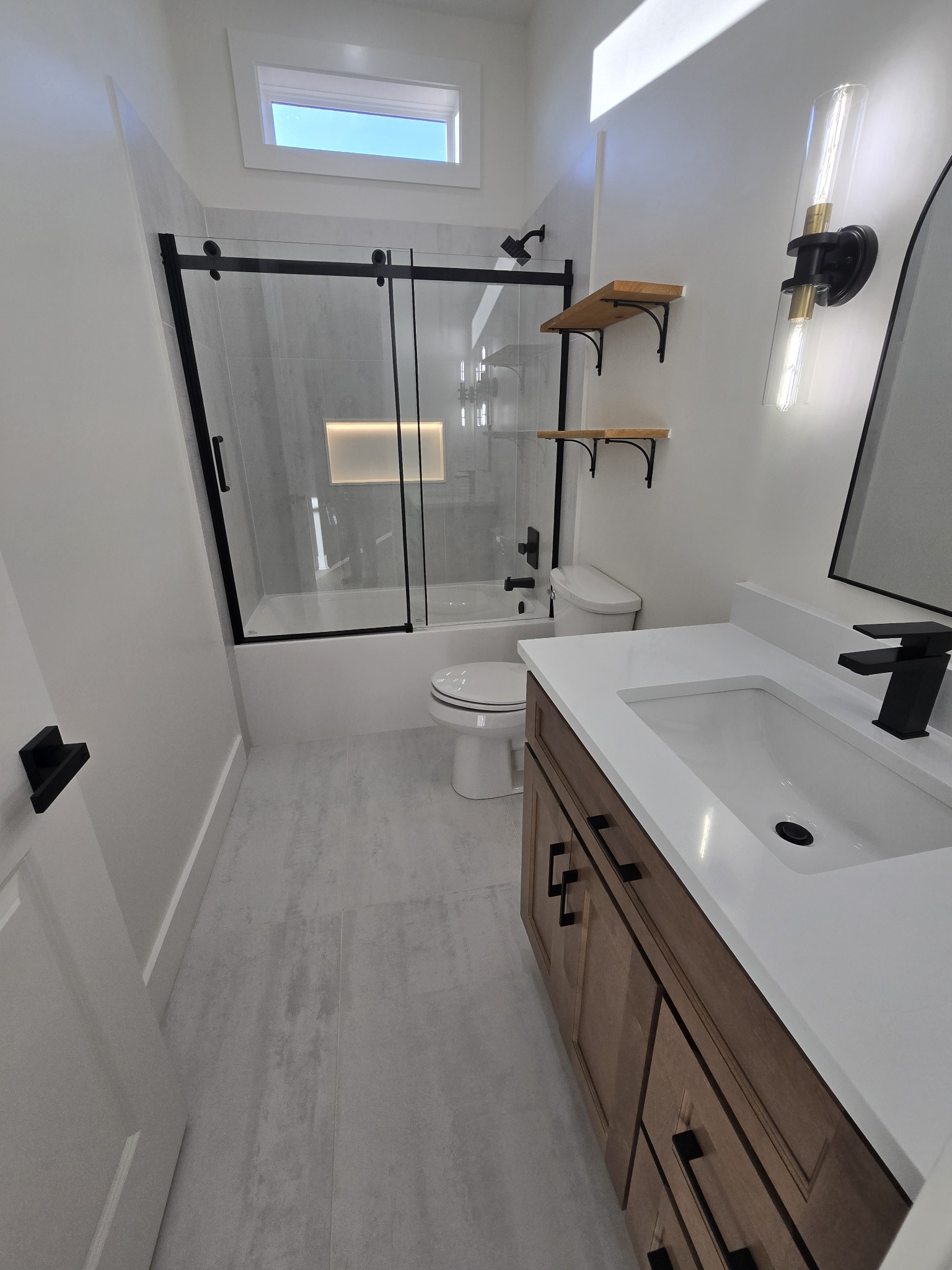 6784 Shelbyville Road Morrison, TN 37357 - Photo 30 of 48 a bathroom with a sink a toilet and shower