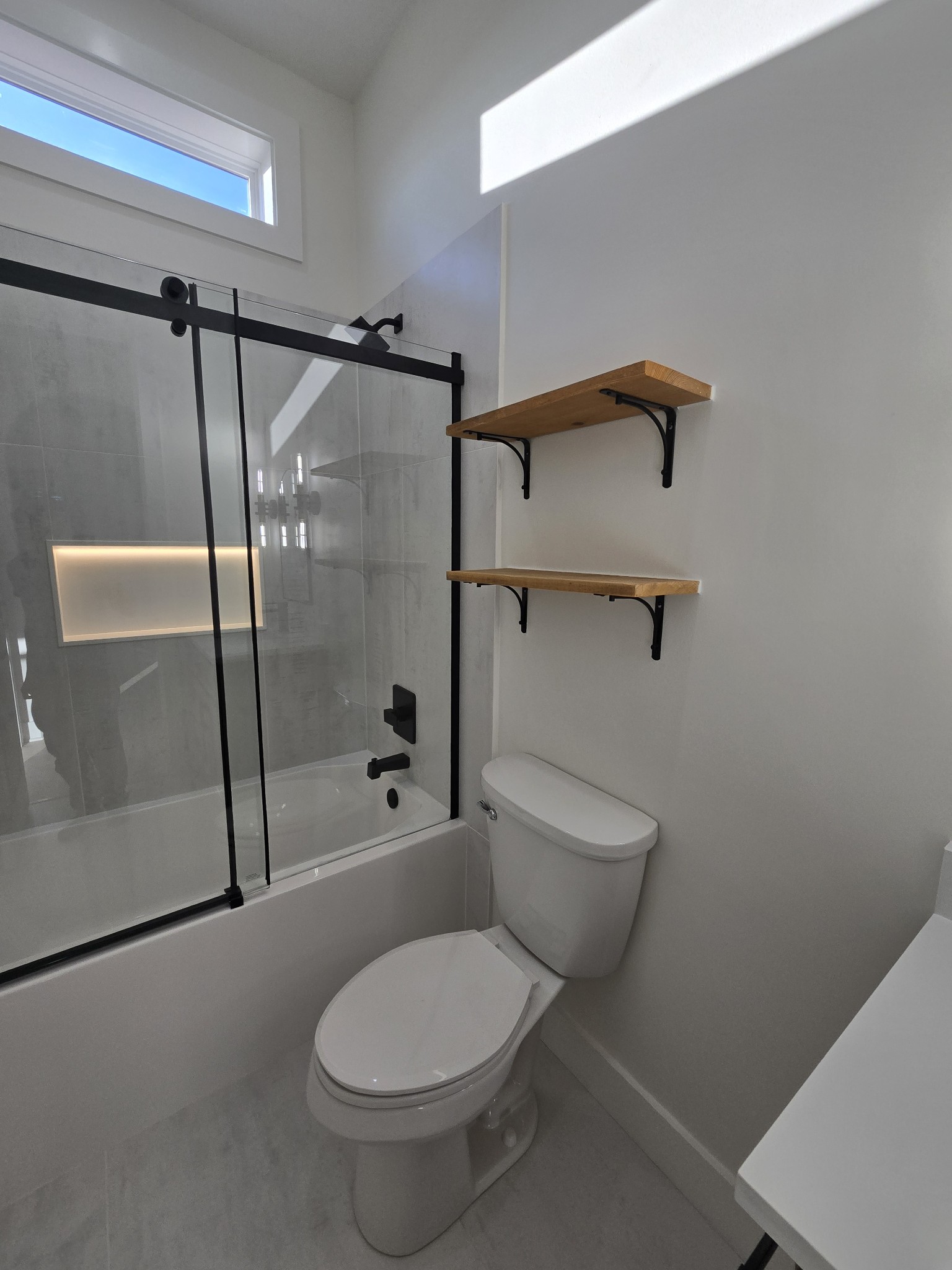 6784 Shelbyville Road Morrison, TN 37357 - Photo 31 of 48 a white toilet sitting next to a bathroom