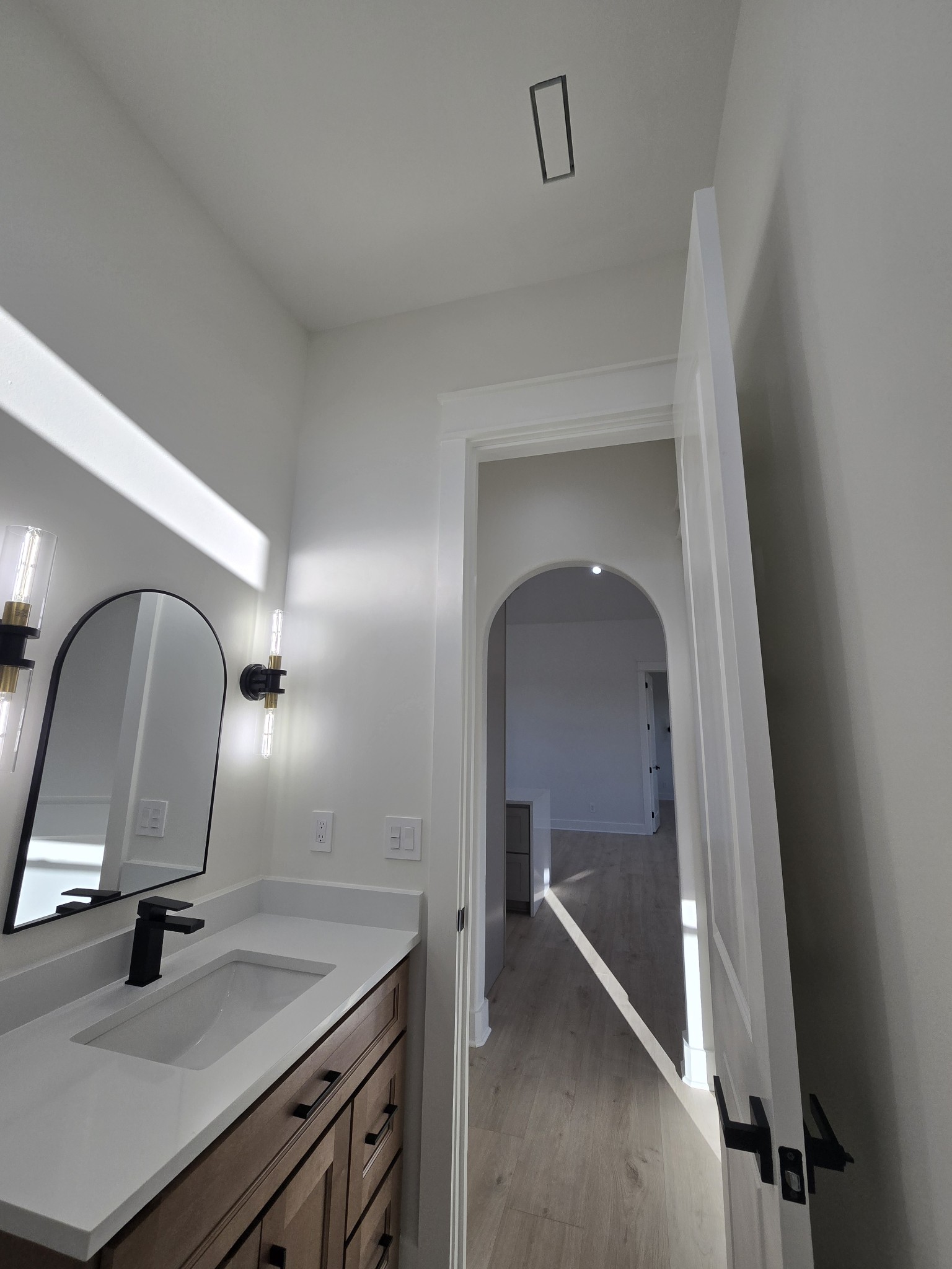 6784 Shelbyville Road Morrison, TN 37357 - Photo 33 of 48 a bathroom with a sink and a mirror