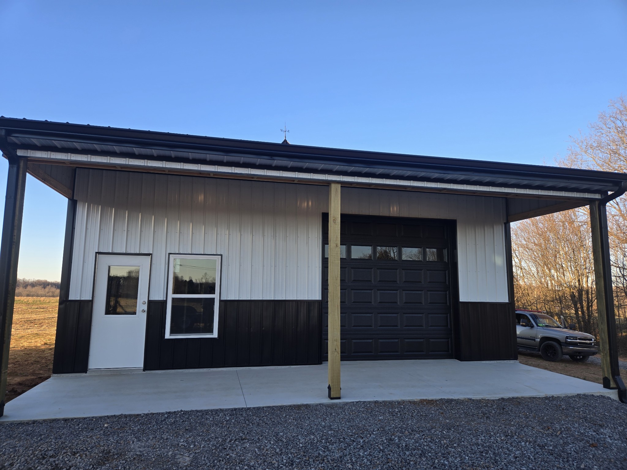 6784 Shelbyville Road Morrison, TN 37357 - Photo 7 of 48 a backyard of a house with barbeque oven