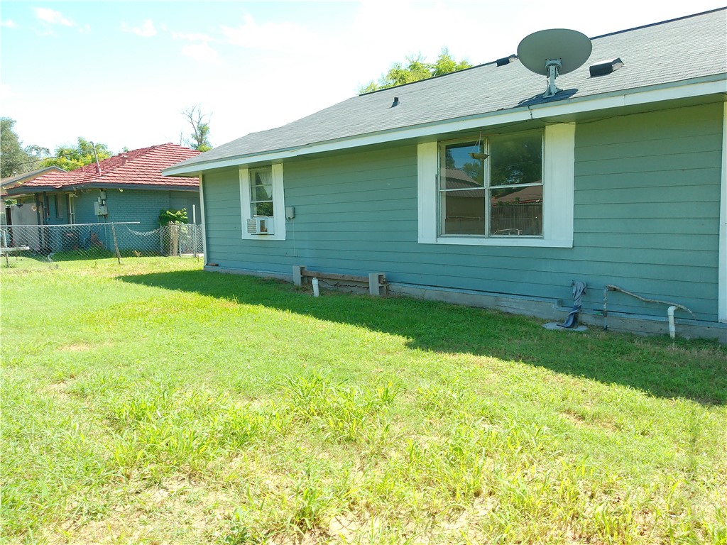 4006 McArdle Road Corpus Christi, TX 78411 - Photo 17 of 17 a view of a house with a backyard