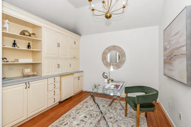 a room with cabinets and wooden floor