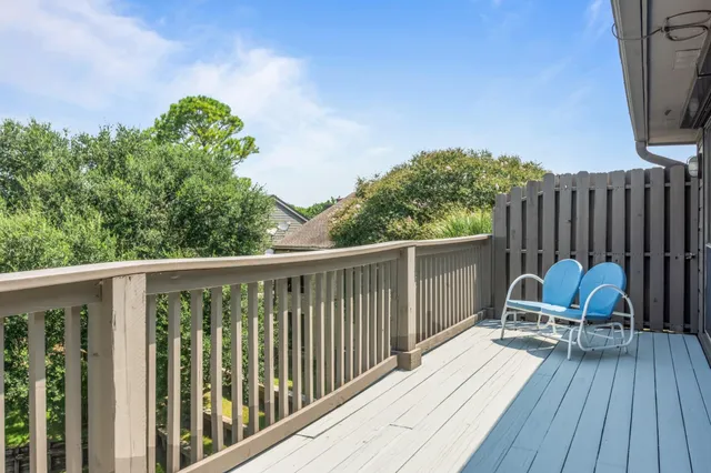 a view of a two chairs on the roof deck