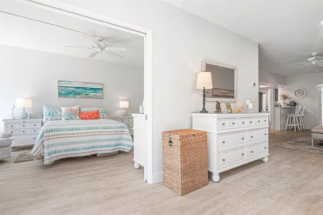 a bedroom with a bed and a dresser