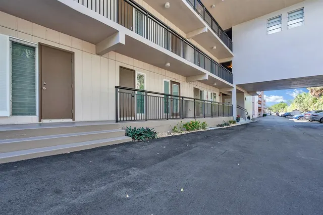 a view of a house with a street