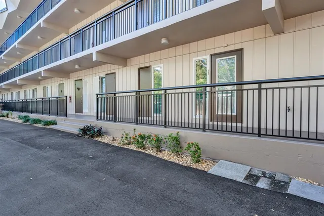 a view of a house with a street