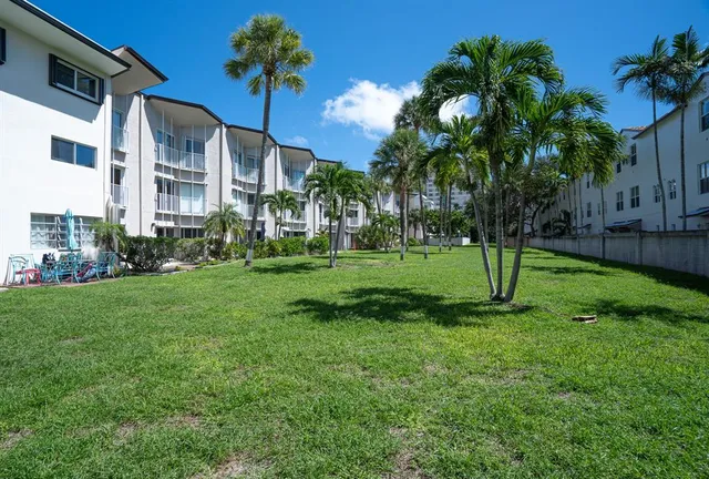 a view of a yard in front of a house