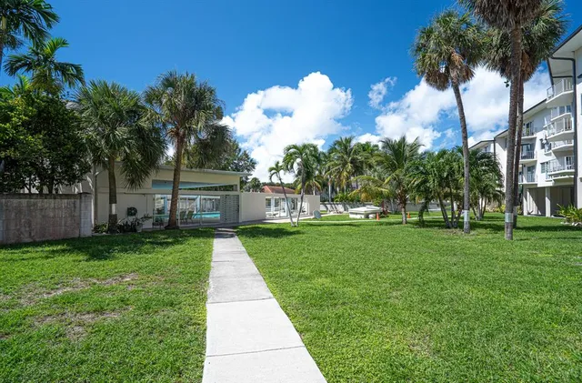 a view of a garden with a fountain