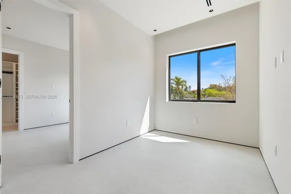 an empty room with windows