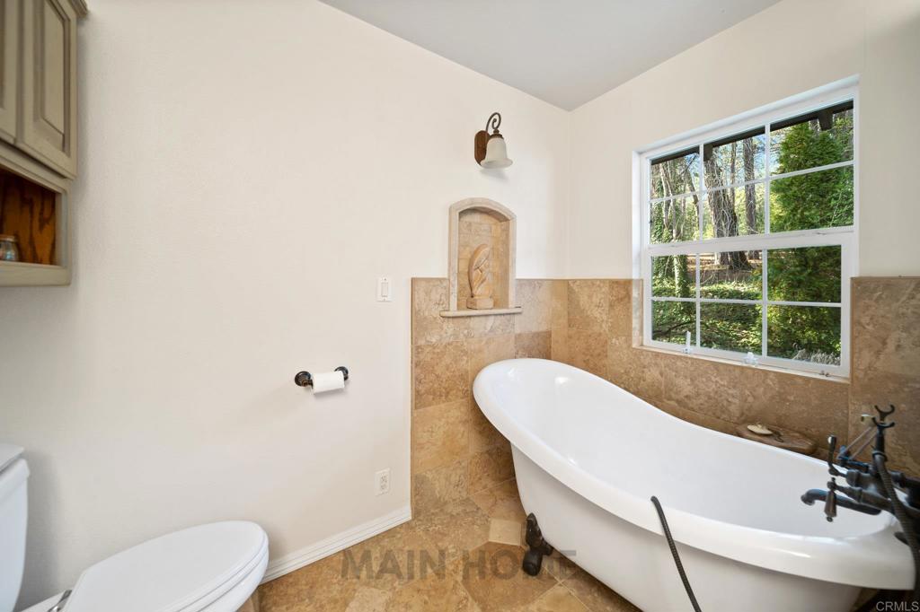 29276 Bullskin Ridge Road Oak Run, CA 96069 - Photo 10 of 21 a bathroom with a sink and a mirror