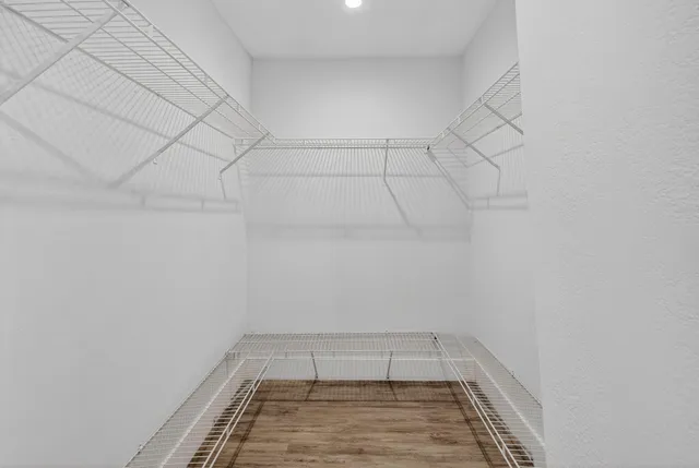 a view of a room with racks on the wall