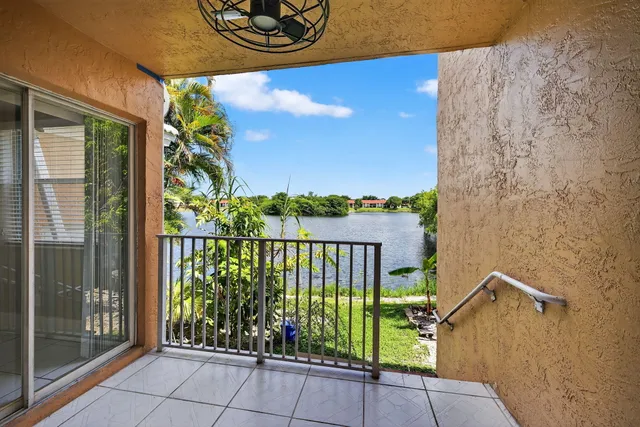 an aerial view of houses with yard