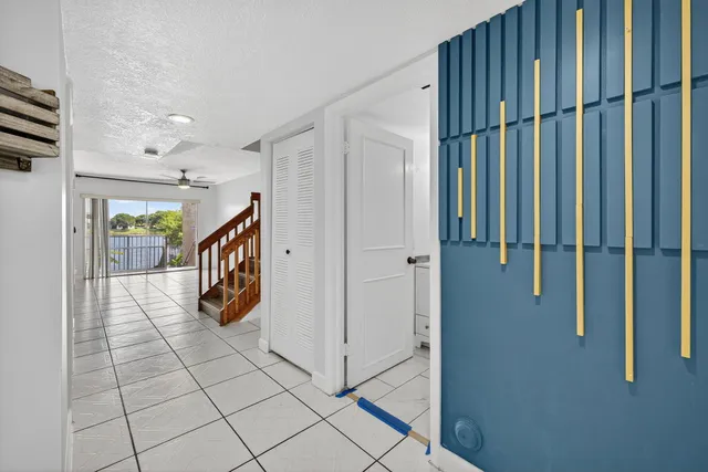 a bathroom with a glass shower door and a bathtub