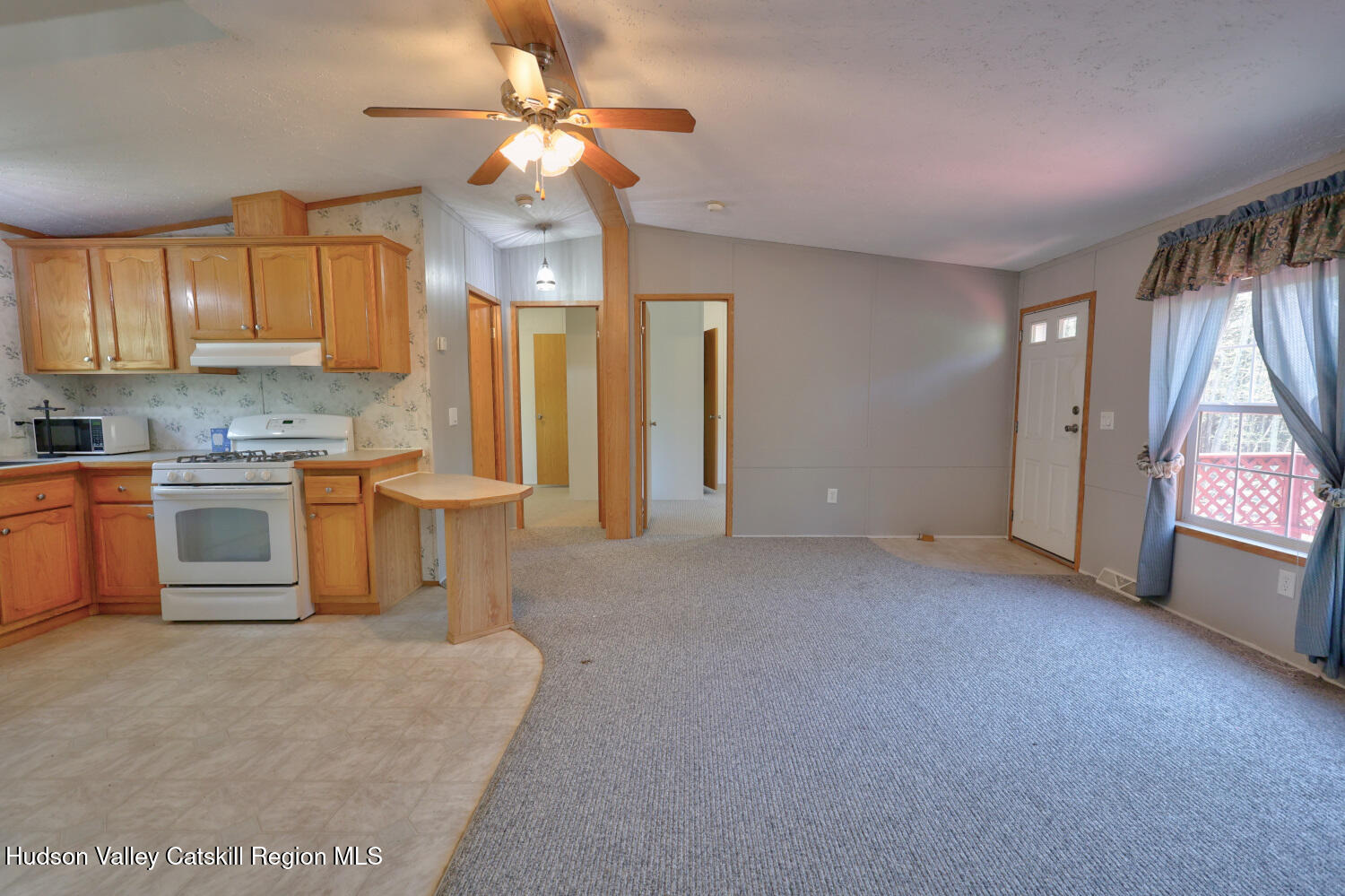 201 Edison Timmerman Road Cairo, NY 12413 - Photo 14 of 49 a view of a kitchen with a sink cabinets and a window