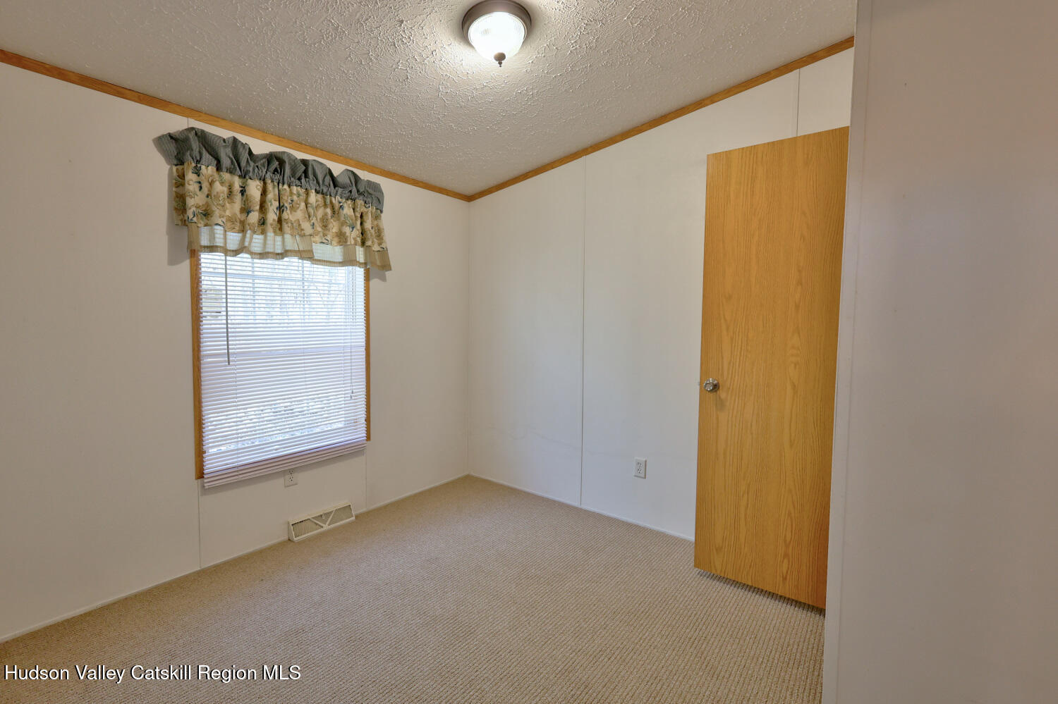 201 Edison Timmerman Road Cairo, NY 12413 - Photo 25 of 49 a view of an empty room with a window