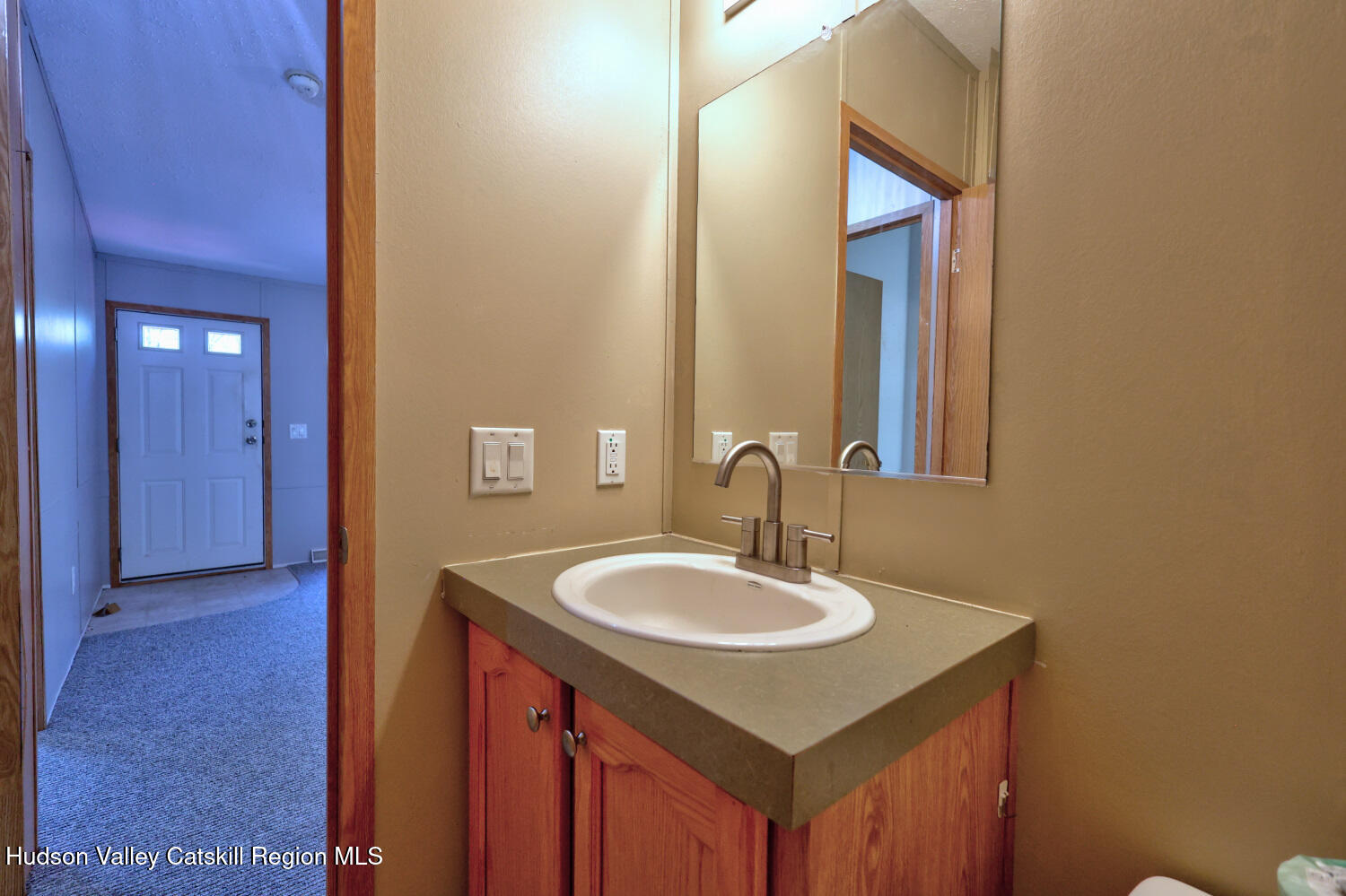 201 Edison Timmerman Road Cairo, NY 12413 - Photo 32 of 49 a bathroom with a sink and a mirror