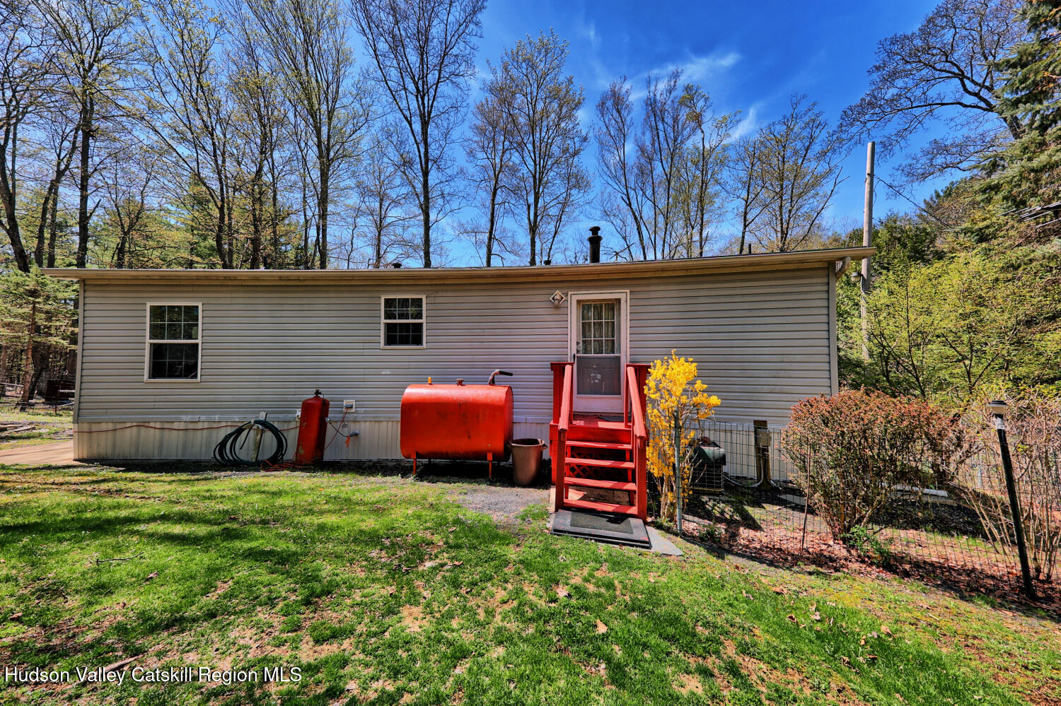 201 Edison Timmerman Road Cairo, NY 12413 - Photo 40 of 49 a view of a backyard with table and chairs and a barbeque