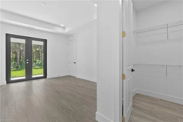 a view of an empty room and window