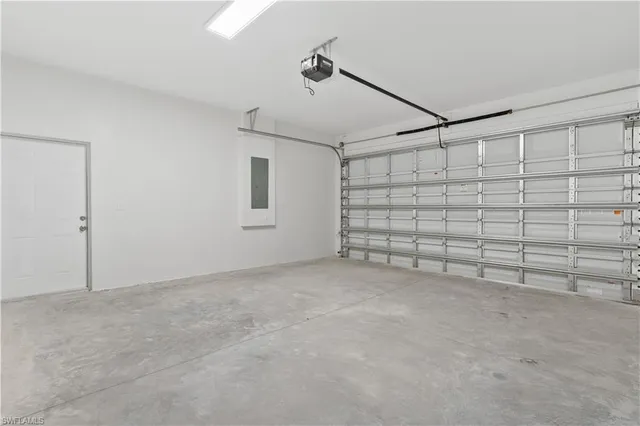 a view of an empty room with glass door