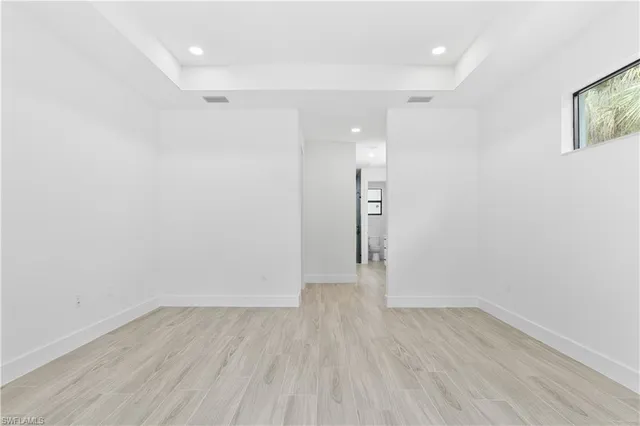 a view of small space with wooden floor