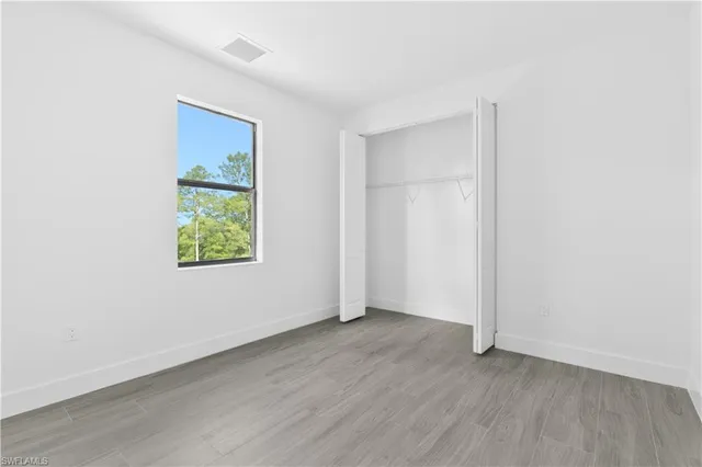 an empty room with window