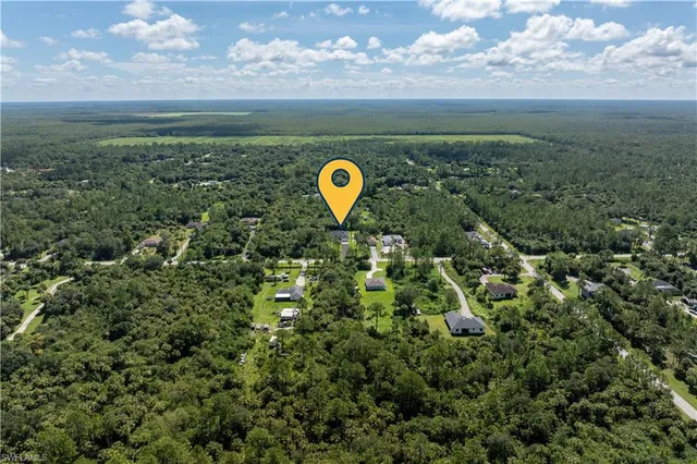 a aerial view of a house with a garden