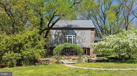 front view of house with a yard