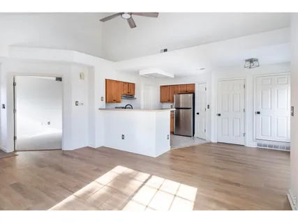 a view of a livingroom with wooden floor
