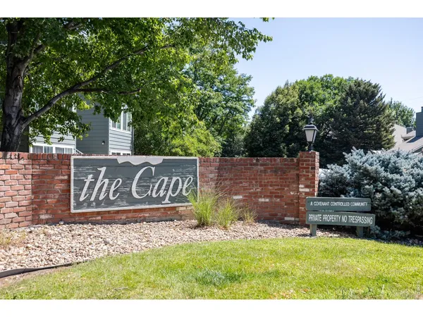 a view of outdoor space with garden and trees