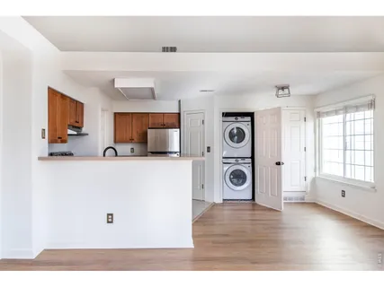 a view of a livingroom with wooden floor